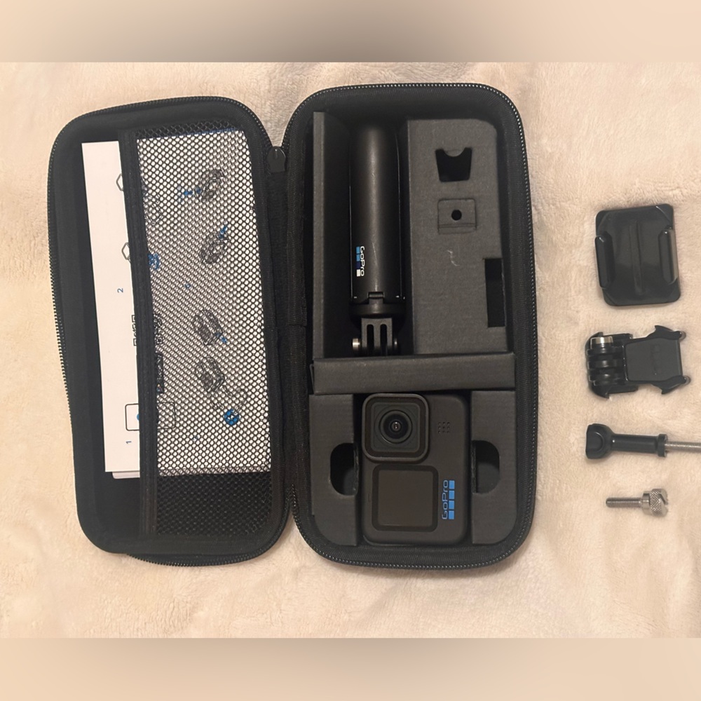 GoPro Action Camera with Black Case and Accessories